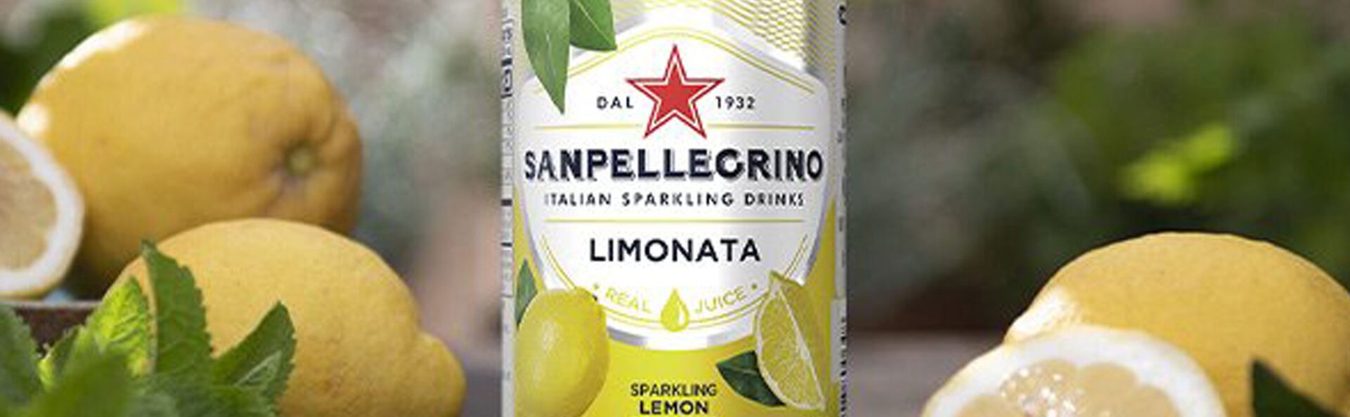 A can of sparkling lemon drink with the word " limonata " written on it.